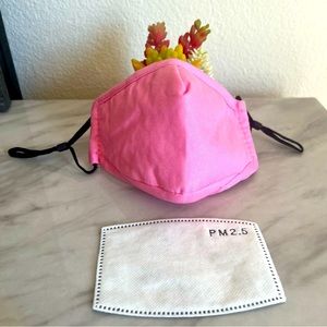 Pink face mask with filter pocket and adjustable ear loops